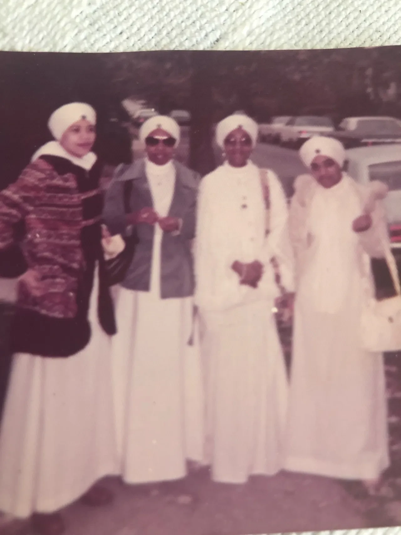 Historic group portrait in coordinated white dress