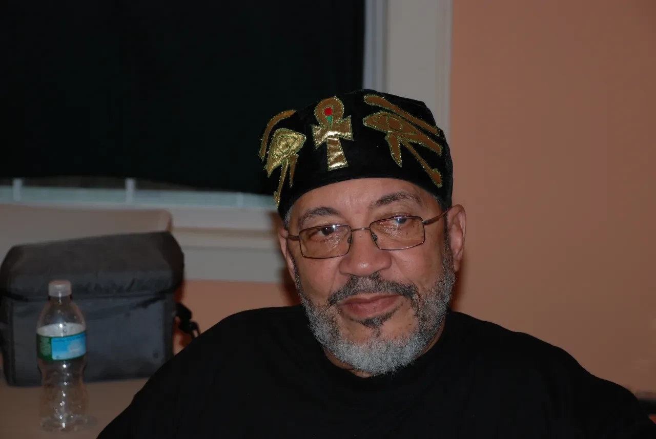 Portrait of a man in decorated ceremonial headwear